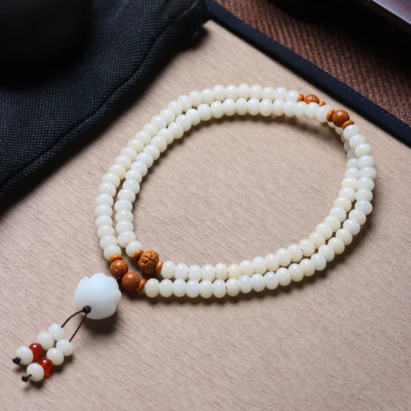 108 Mala Beads White Jade Bodhi Bracelet with Carved Lotus Pendant and Olive Pit Spacers - Image 4