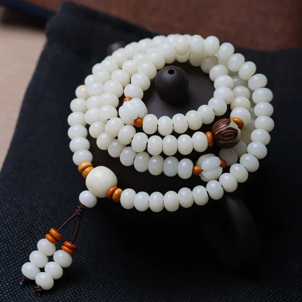 White Jade Bodhi 108 Mala Beads Bracelet with Hand-Carved Lotus Beads and Olive Pit Spacers - Image 6