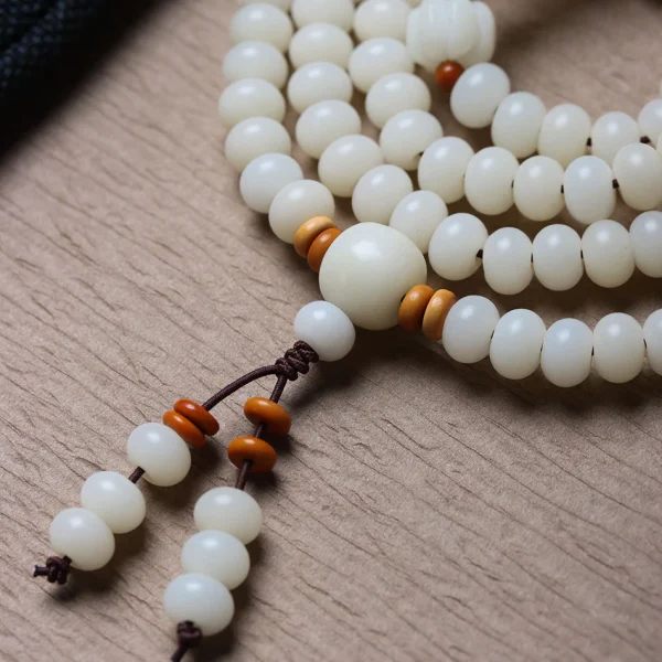 White Jade Bodhi 108 Mala Beads Bracelet with Hand-Carved Lotus Beads and Olive Pit Spacers - Image 5
