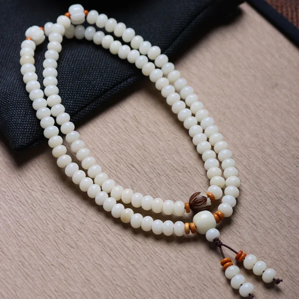 White Jade Bodhi 108 Mala Beads Bracelet with Hand-Carved Lotus Beads and Olive Pit Spacers - Image 4